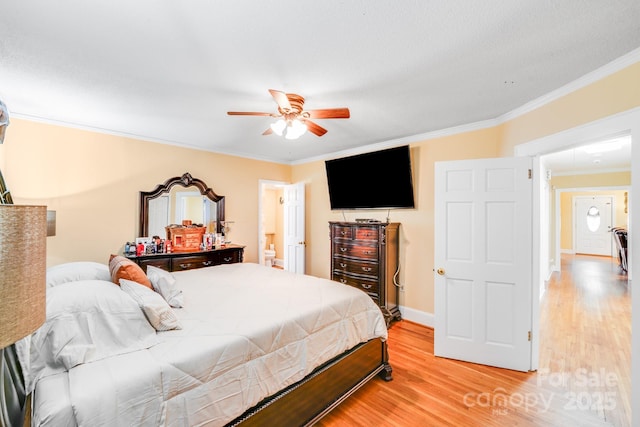 1004 Venus St, Kannapolis, NC 28083 - bedroom with ornamental molding, light wood finished floors, and ceiling fan