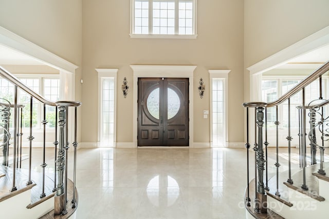 802 Capington Ln, Waxhaw, NC 28173 - foyer entrance with a high ceiling, stairs, and healthy amount of natural light