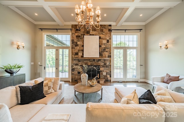 802 Capington Ln, Waxhaw, NC 28173 - living room featuring coffered ceiling, a chandelier, wood finished floors, beam ceiling, and crown molding