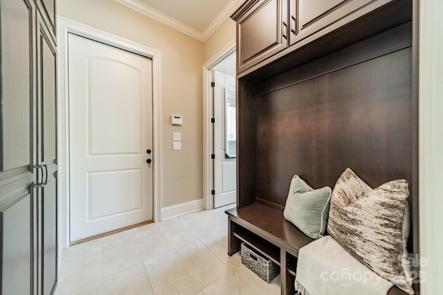 802 Capington Ln, Waxhaw, NC 28173 - mudroom with ornamental molding and light tile patterned flooring