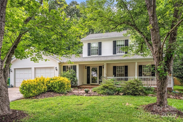 1230 Ridgebury Ter, Matthews, NC 28105 - view of front of home with a garage, concrete driveway, a porch, a front yard, and a shingled roof