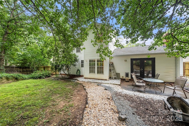 1230 Ridgebury Ter, Matthews, NC 28105 - back of house featuring french doors and a patio