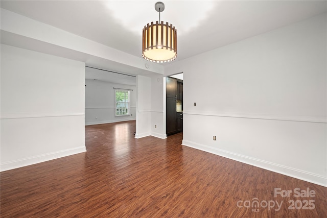 1230 Ridgebury Ter, Matthews, NC 28105 - unfurnished room featuring dark wood-type flooring and baseboards