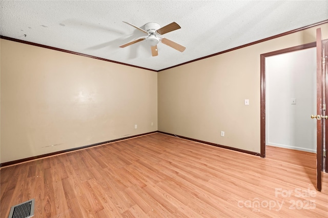 1230 Ridgebury Ter, Matthews, NC 28105 - empty room featuring a ceiling fan, crown molding, light wood-type flooring, and a textured ceiling