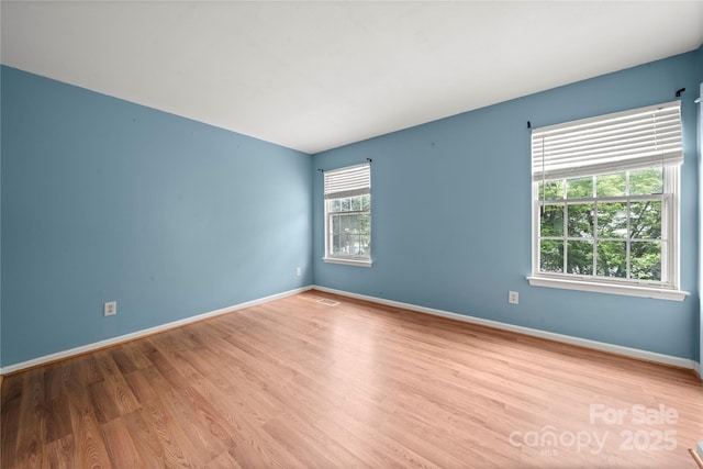 1230 Ridgebury Ter, Matthews, NC 28105 - empty room with wood finished floors and baseboards