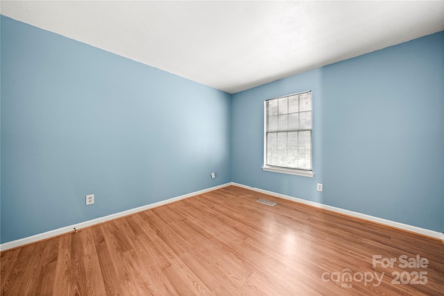 1230 Ridgebury Ter, Matthews, NC 28105 - empty room featuring baseboards and wood finished floors