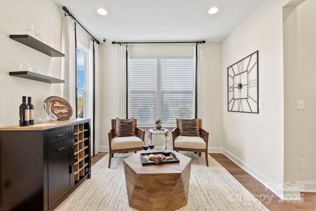 158 Nicholson Ln, Mooresville, NC 28115 - sitting room featuring a bar, light wood-type flooring, and recessed lighting