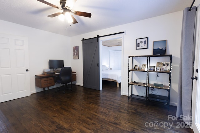 373 Fox Trace Dr, Sylva, NC 28779 - home office with wood finished floors, ceiling fan, and a barn door