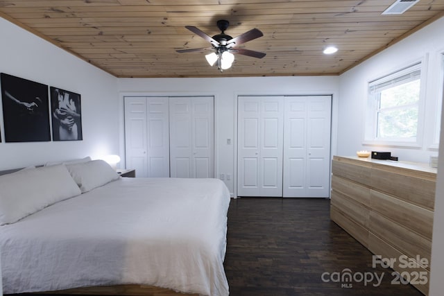 373 Fox Trace Dr, Sylva, NC 28779 - bedroom featuring wood ceiling, multiple closets, dark wood-style flooring, and a ceiling fan
