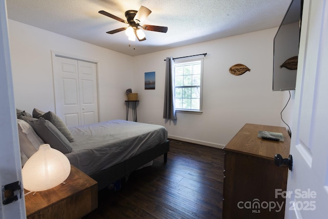 373 Fox Trace Dr, Sylva, NC 28779 - bedroom featuring hardwood / wood-style flooring, a closet, a ceiling fan, and a textured ceiling