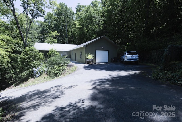 373 Fox Trace Dr, Sylva, NC 28779 - single story home with driveway and an attached garage