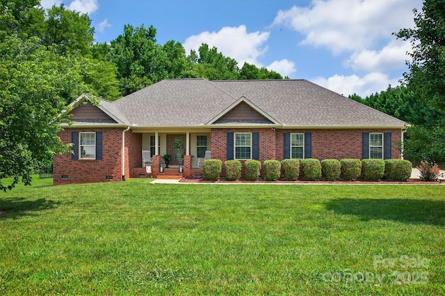 210 Cool Side Dr, Salisbury, NC 28146 - view of front facade with brick siding, a front lawn, a porch, and roof with shingles