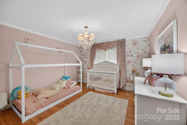 210 Cool Side Dr, Salisbury, NC 28146 - bedroom featuring crown molding, a chandelier, and wood finished floors