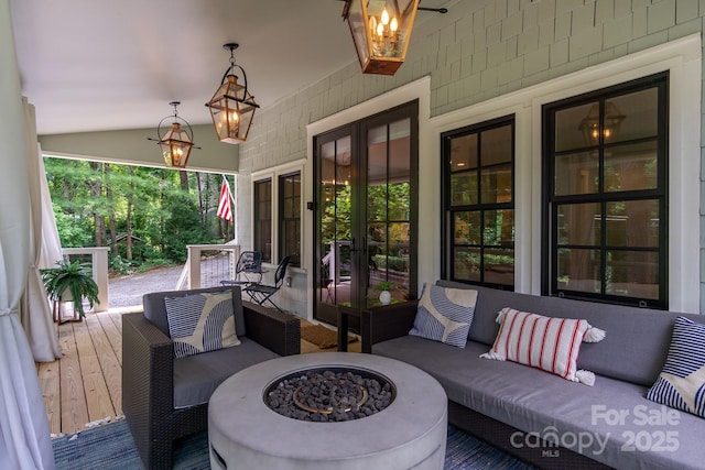 611 Hiawassee Rd, Black Mountain, NC 28711 - wooden terrace with french doors and an outdoor living space with a fire pit