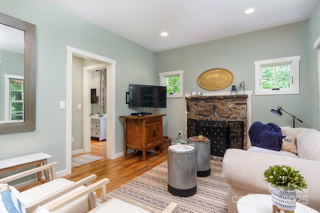 611 Hiawassee Rd, Black Mountain, NC 28711 - living area with wood finished floors, healthy amount of natural light, recessed lighting, and a fireplace