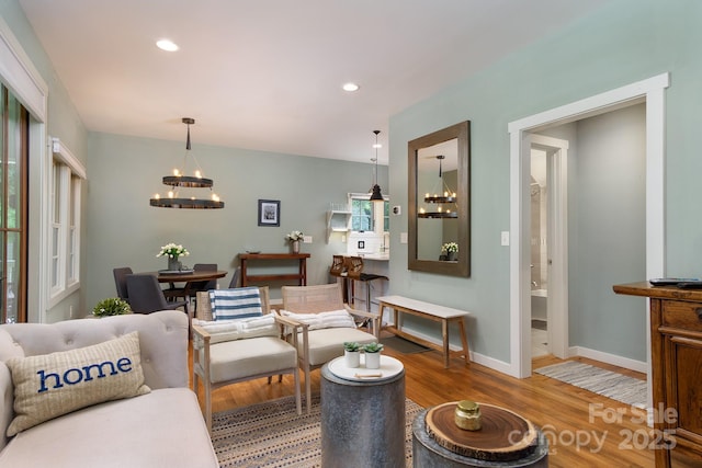 611 Hiawassee Rd, Black Mountain, NC 28711 - living area with a chandelier, wood finished floors, and recessed lighting