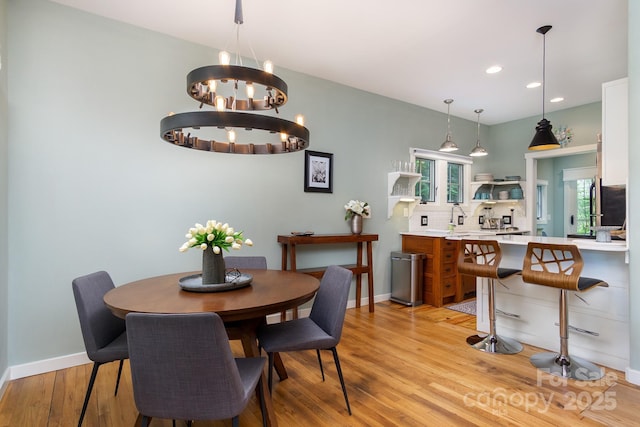 611 Hiawassee Rd, Black Mountain, NC 28711 - dining space featuring light wood-style floors, a chandelier, and recessed lighting