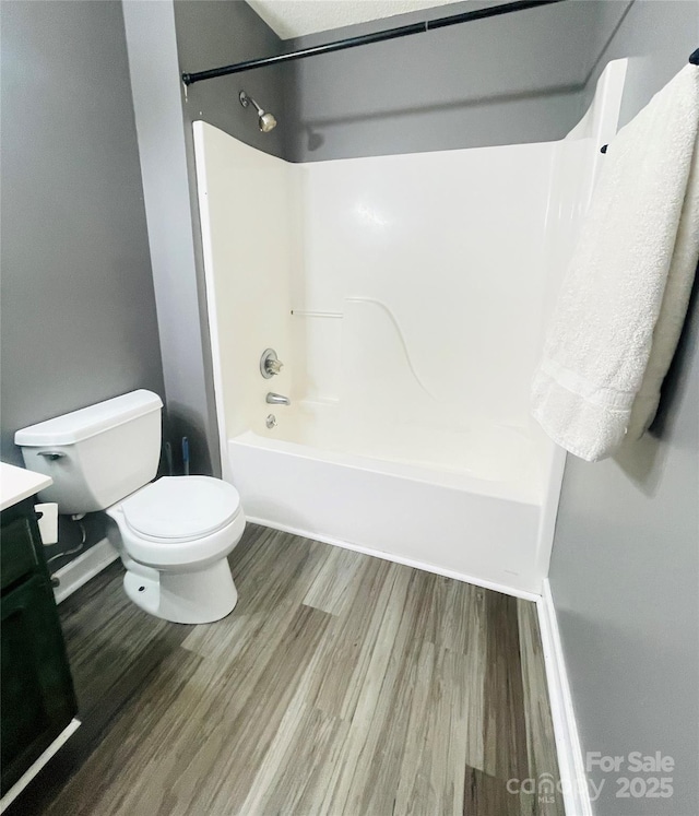 286 Little Wilkesboro Rd, Harmony, NC 28634 - bathroom with vanity,  shower combination, and wood finished floors
