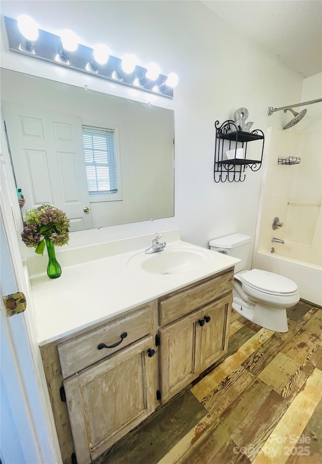 286 Little Wilkesboro Rd, Harmony, NC 28634 - full bathroom with vanity, wood finished floors, and bathtub / shower combination