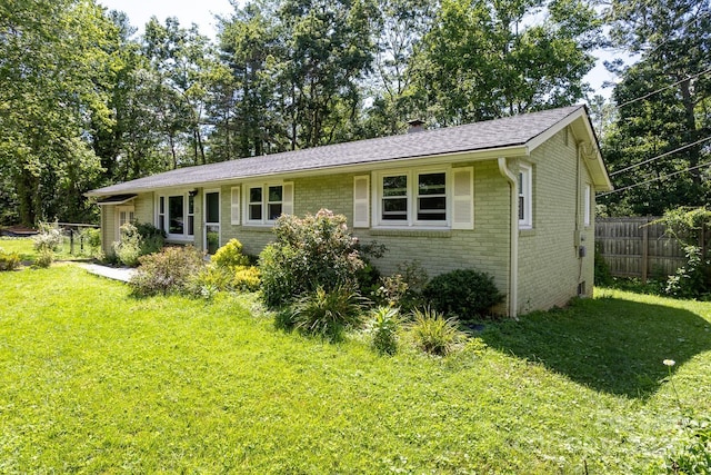 50 Taft St, Black Mountain, NC 28711 - view of front of home with brick siding and a chimney