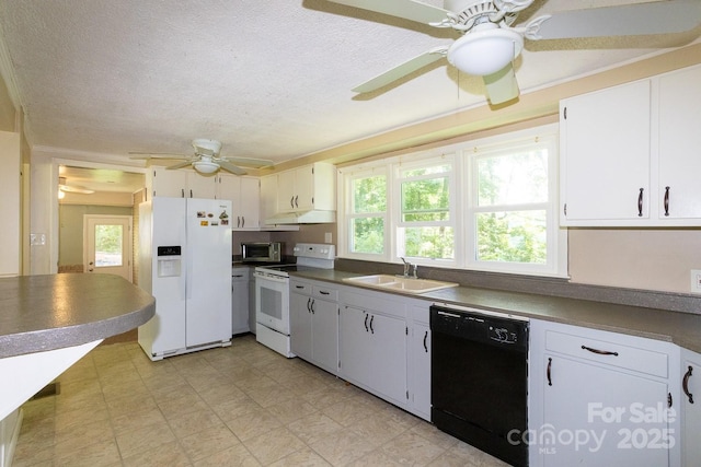 50 Taft St, Black Mountain, NC 28711 - kitchen featuring white appliances, under cabinet range hood, ceiling fan, dark countertops, and a textured ceiling