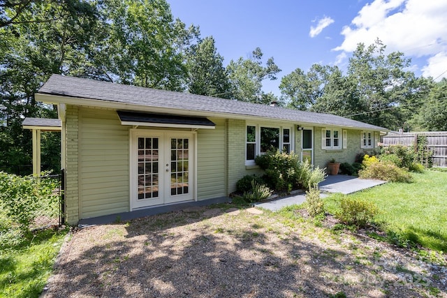 50 Taft St, Black Mountain, NC 28711 - view of front facade featuring french doors and brick siding
