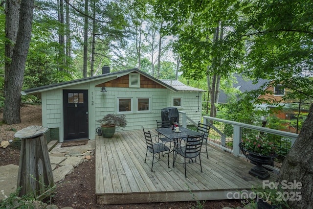 112 Byrd Rd, Black Mountain, NC 28711 - wooden terrace with outdoor dining space and a grill