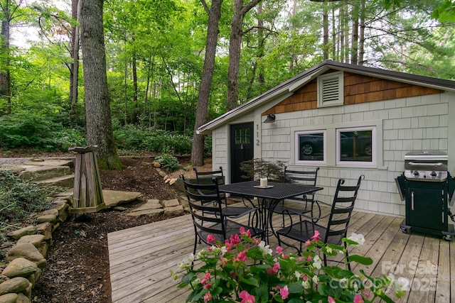 112 Byrd Rd, Black Mountain, NC 28711 - wooden deck featuring outdoor dining space and area for grilling