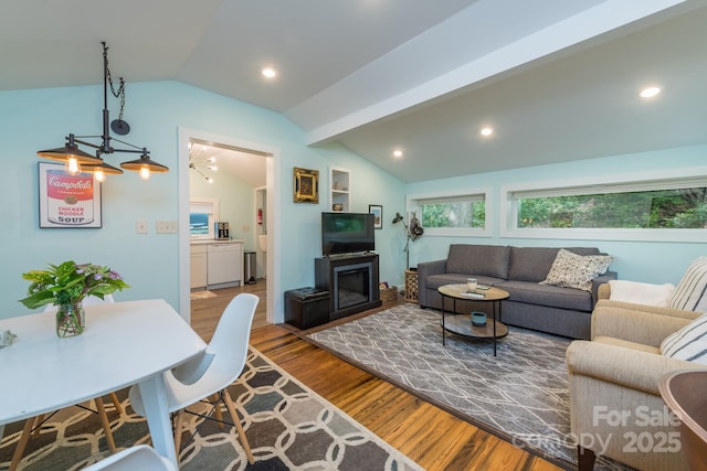 112 Byrd Rd, Black Mountain, NC 28711 - living room with vaulted ceiling, wood finished floors, and recessed lighting