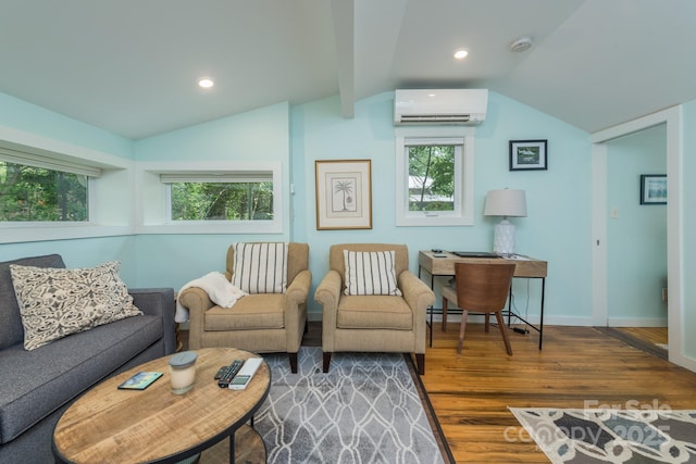112 Byrd Rd, Black Mountain, NC 28711 - living area with a wall mounted air conditioner, vaulted ceiling, wood finished floors, and recessed lighting