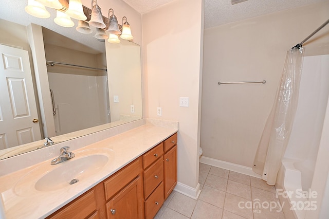 202 Pine Meadows St, Hickory, NC 28601 - bathroom featuring tile patterned flooring, a textured ceiling, vanity, and shower / bath combo