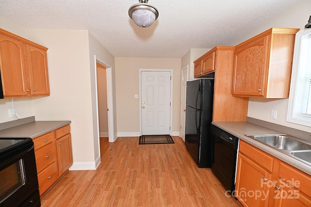 202 Pine Meadows St, Hickory, NC 28601 - kitchen featuring black appliances, light wood-style floors, and a textured ceiling