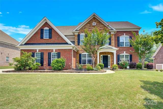 2805 Julian Glen Cir, Waxhaw, NC 28173 - colonial home featuring a front yard and brick siding