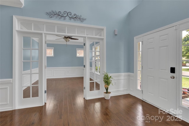 2805 Julian Glen Cir, Waxhaw, NC 28173 - entryway with wainscoting, ceiling fan, a decorative wall, and dark wood-style floors