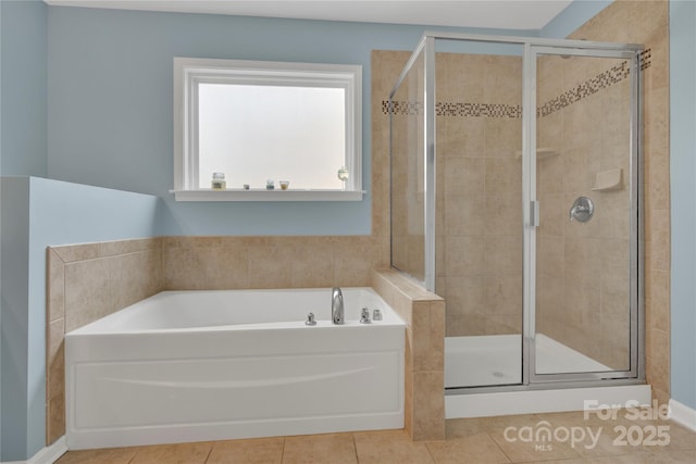 2805 Julian Glen Cir, Waxhaw, NC 28173 - bathroom with a bath, a shower stall, and tile patterned floors