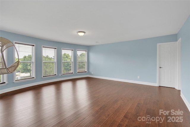 2805 Julian Glen Cir, Waxhaw, NC 28173 - spare room with dark wood-style floors and baseboards