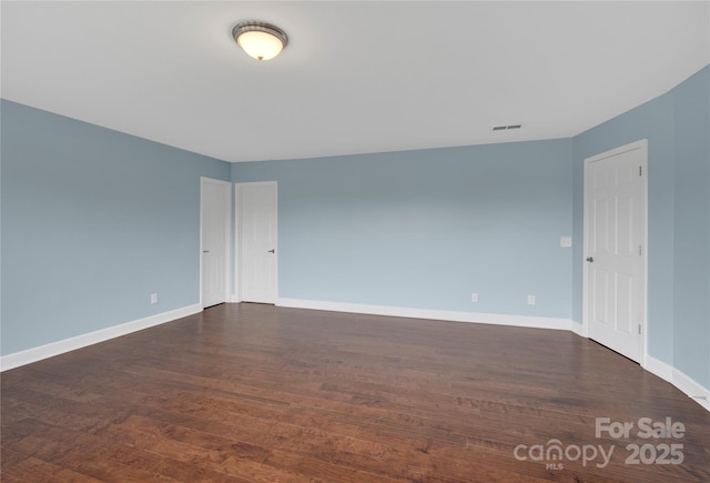 2805 Julian Glen Cir, Waxhaw, NC 28173 - empty room featuring baseboards and dark wood-type flooring