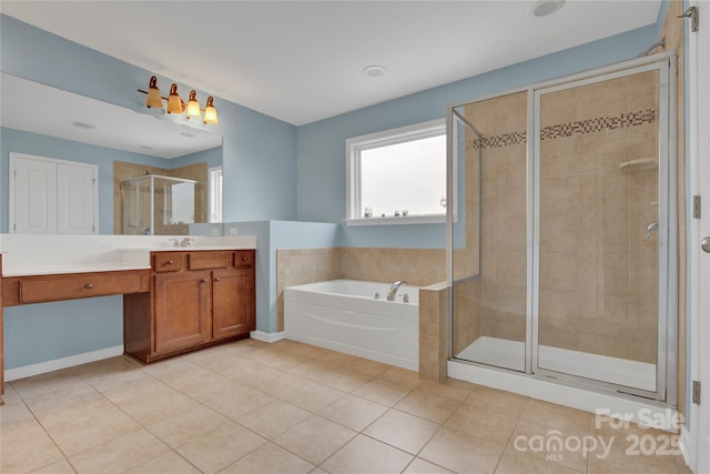 2805 Julian Glen Cir, Waxhaw, NC 28173 - bathroom with a bath, vanity, a shower stall, and tile patterned flooring