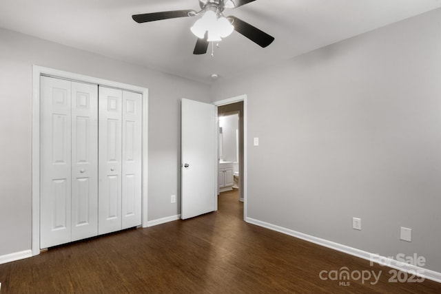 6101 Mcgregor Dr, Charlotte, NC 28227 - unfurnished bedroom with dark wood-style flooring, a closet, and a ceiling fan