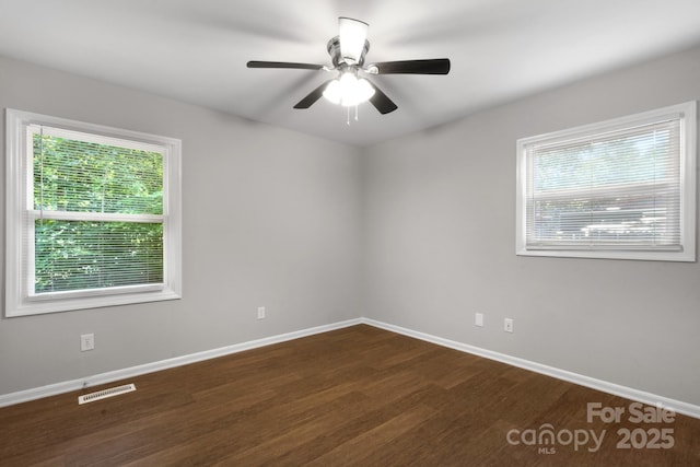 6101 Mcgregor Dr, Charlotte, NC 28227 - spare room with plenty of natural light, wood finished floors, and ceiling fan
