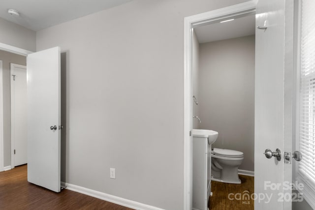 6101 Mcgregor Dr, Charlotte, NC 28227 - bedroom with wood finished floors and baseboards