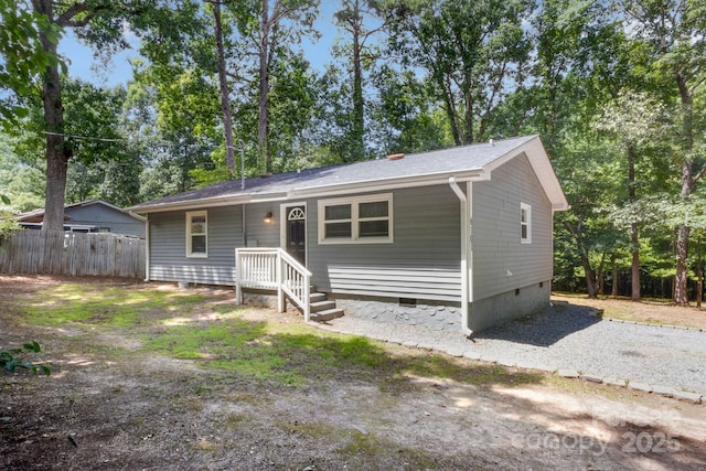 6101 Mcgregor Dr, Charlotte, NC 28227 - view of front of home featuring crawl space and view of wooded area