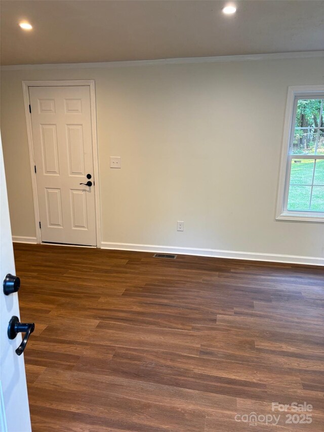 114 Woodberry Dr, Cherryville, NC 28021 - unfurnished room featuring crown molding, recessed lighting, and dark wood-style flooring