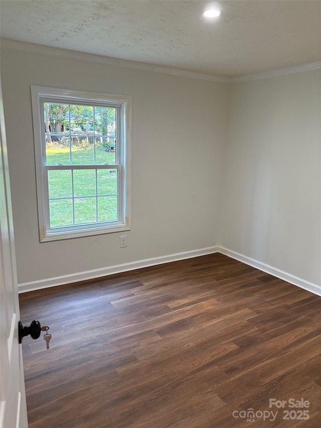 114 Woodberry Dr, Cherryville, NC 28021 - unfurnished room with dark wood-type flooring and crown molding