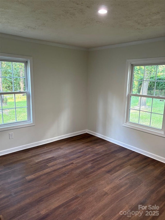 114 Woodberry Dr, Cherryville, NC 28021 - empty room featuring healthy amount of natural light, dark wood-style floors, crown molding, recessed lighting, and a textured ceiling
