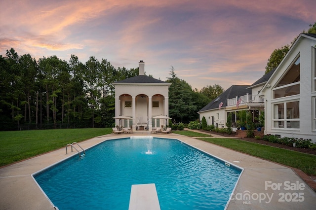 533 Valley Run Dr, Waxhaw, NC 28173 - outdoor pool with a lawn, a patio area, and a diving board