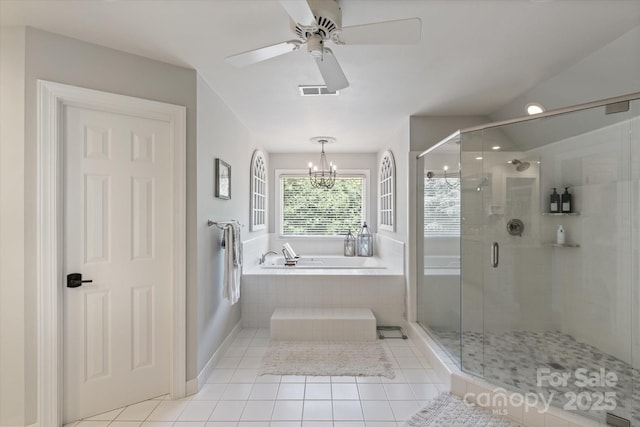 533 Valley Run Dr, Waxhaw, NC 28173 - full bathroom featuring a bath, a stall shower, tile patterned floors, a chandelier, and a ceiling fan