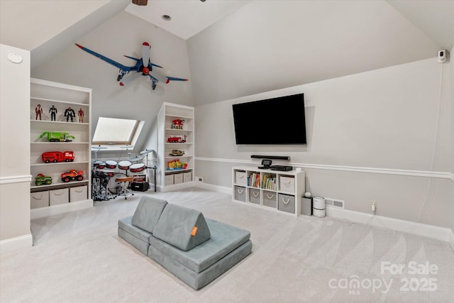 533 Valley Run Dr, Waxhaw, NC 28173 - living room featuring carpet, ceiling fan, high vaulted ceiling, and built in shelves