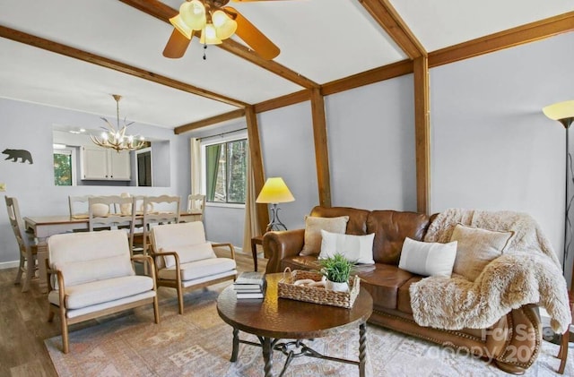 26 Pinetop Cir Unit B, Banner Elk, NC 28604 - living room featuring healthy amount of natural light, a chandelier, light wood-type flooring, beam ceiling, and ceiling fan