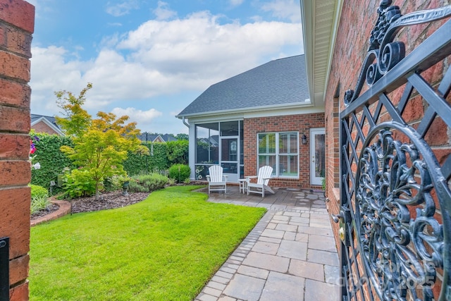 971 Blakeley Walk, Rock Hill, SC 29732 - view of green lawn featuring a sunroom and a patio area